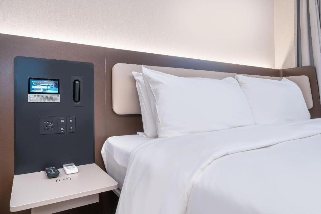 Hanting Hotel Beijing Wangfujing Экстерьер фото